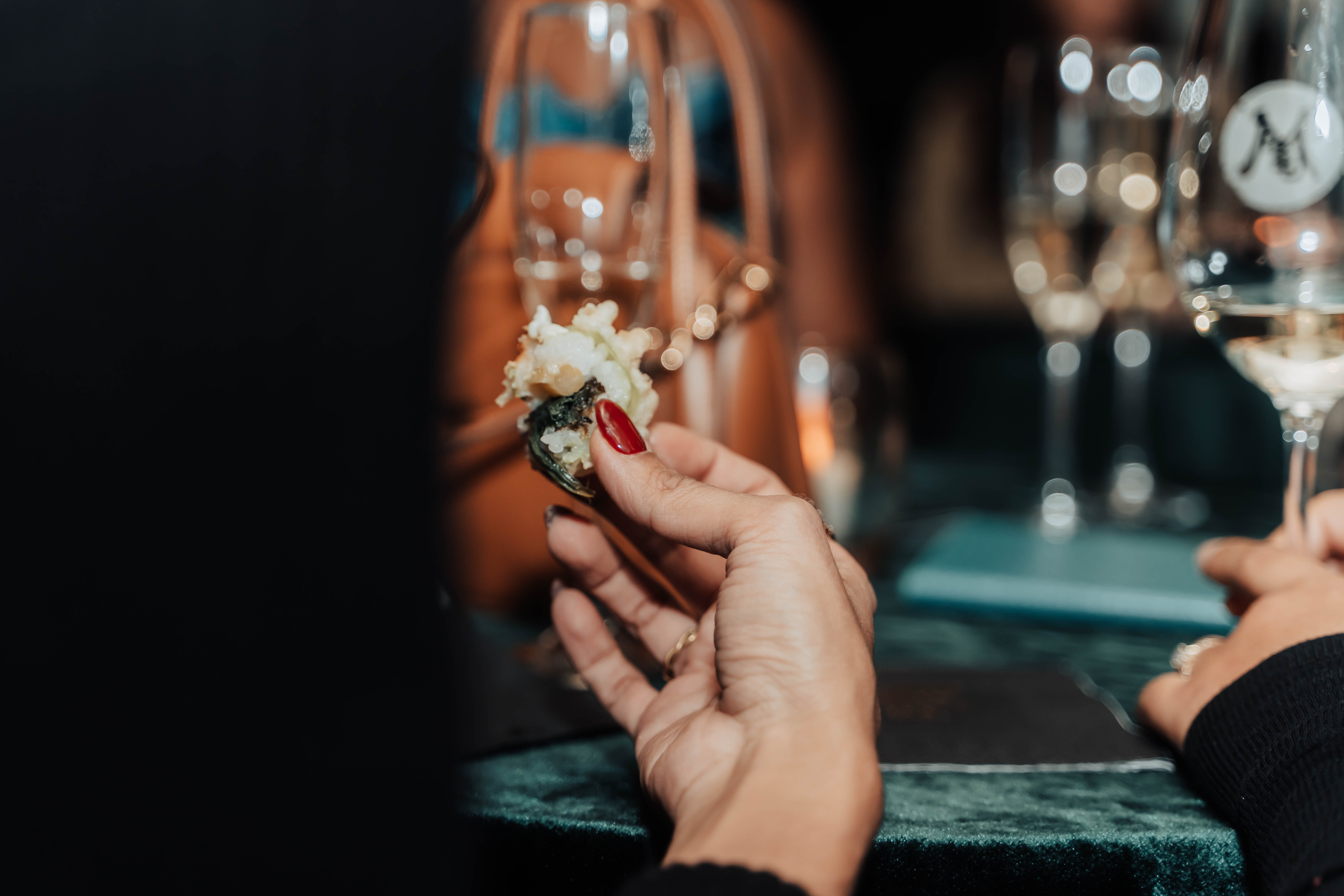 A candid moment at a private EA Society dinner.